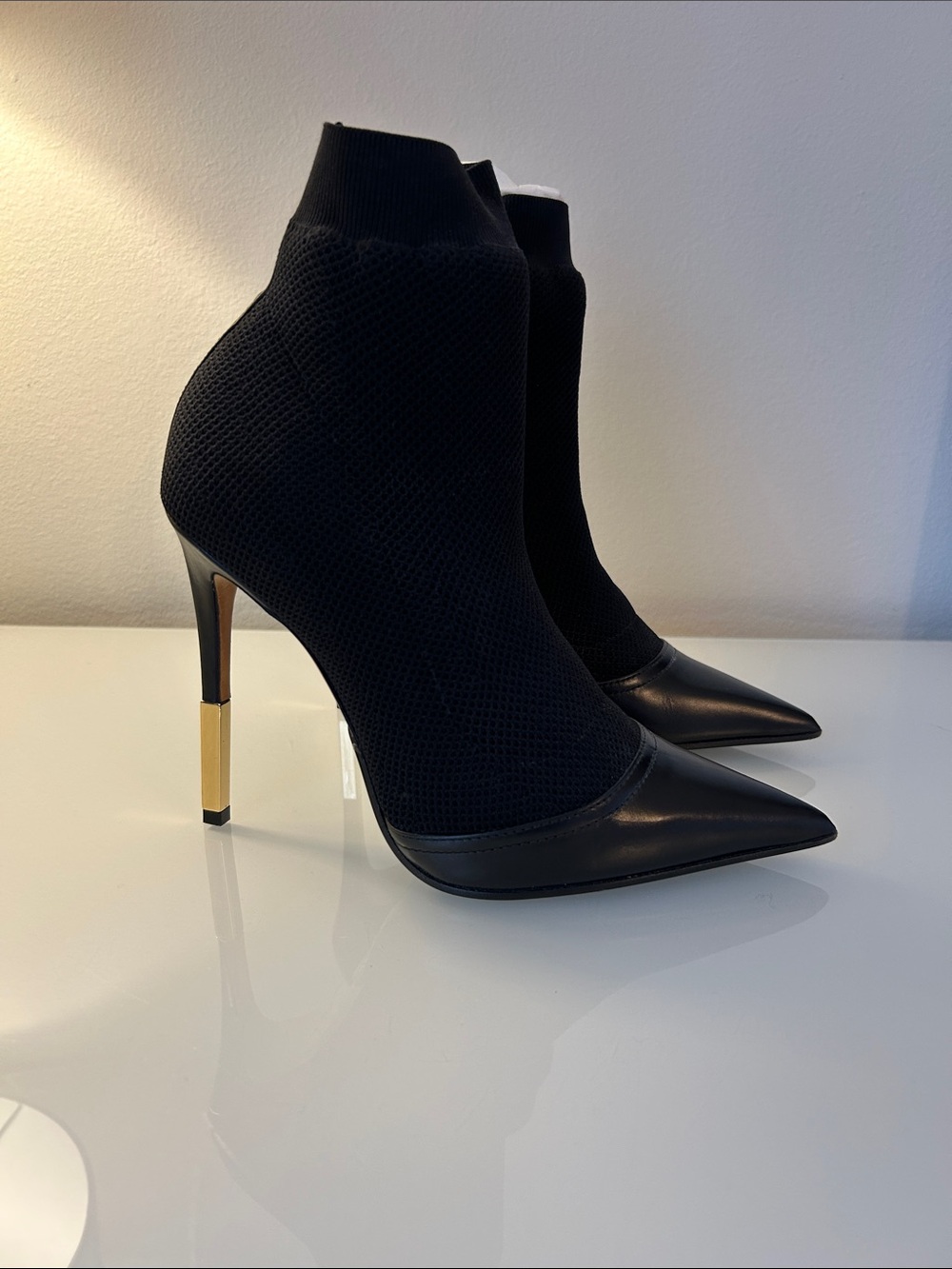 Balmain booties Women's Black Pointed Sock Boot with Gold Heel Accent
